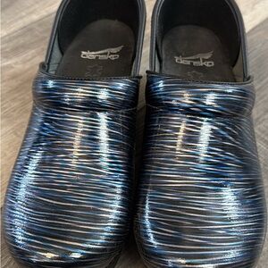 Dansko Blue and Black Glossy Clogs with Striped Design